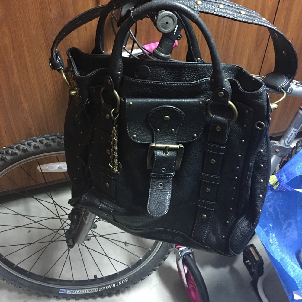 Shoulder bag solid heavy leather w brass grommets