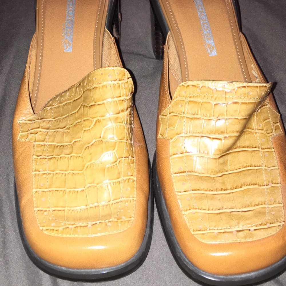 Size 8 1/2 Nine West slip ons. camel & tan color.