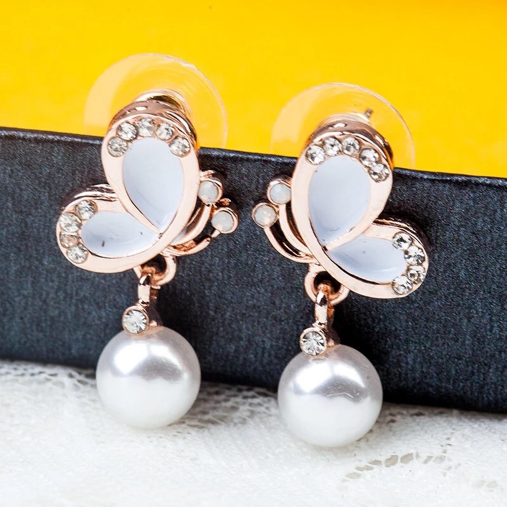 Butterfly pearl earrings