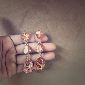 Rose gold colored earrings
