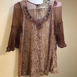 Beautiful lace blouse with intricate detailing