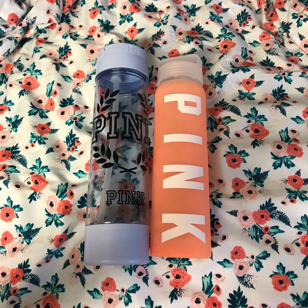 2 PINK water bottles. One glass on plastic
