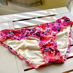 Multi colored leopard print bikini bottoms.