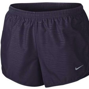 NWT Nike running shorts with back pocket.