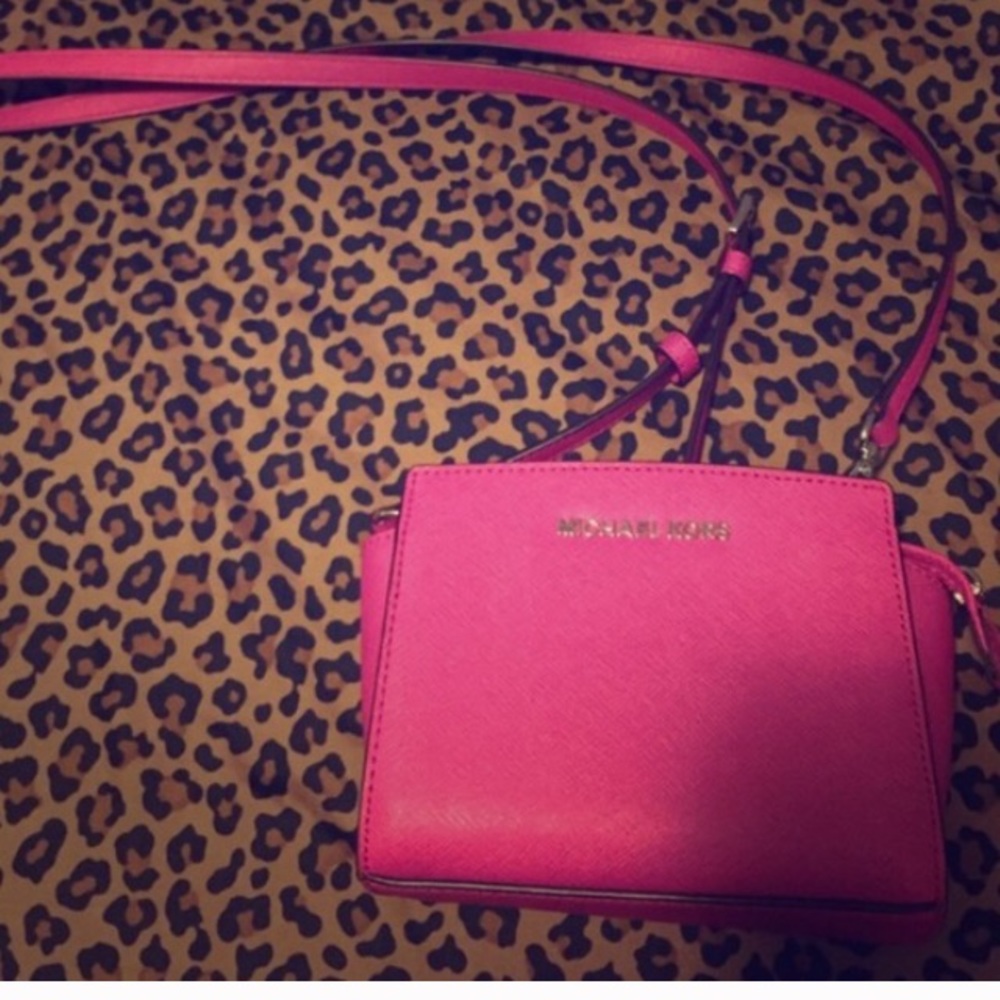Pink Michael kor cross body bag