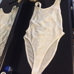 White onesie. See through