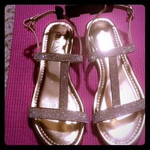 Guess gold colored sandals with rhinestones. New