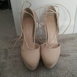 Beige tie up heels