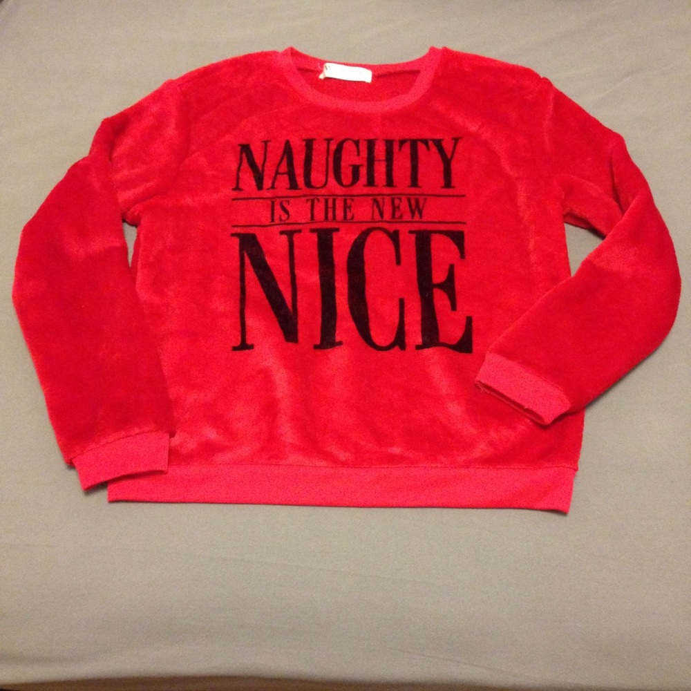 Soft plushy red sweater. Naughty Nice