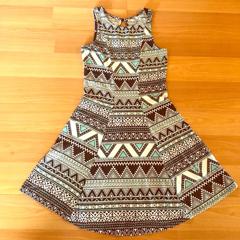 No sleeve girls dress.     MUDD