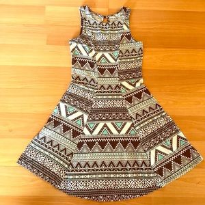 No sleeve girls dress.     MUDD