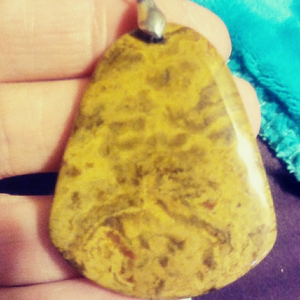 4 Beautiful & Authentic stone pendants remain!