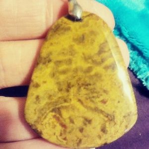 4 Beautiful & Authentic stone pendants remain!