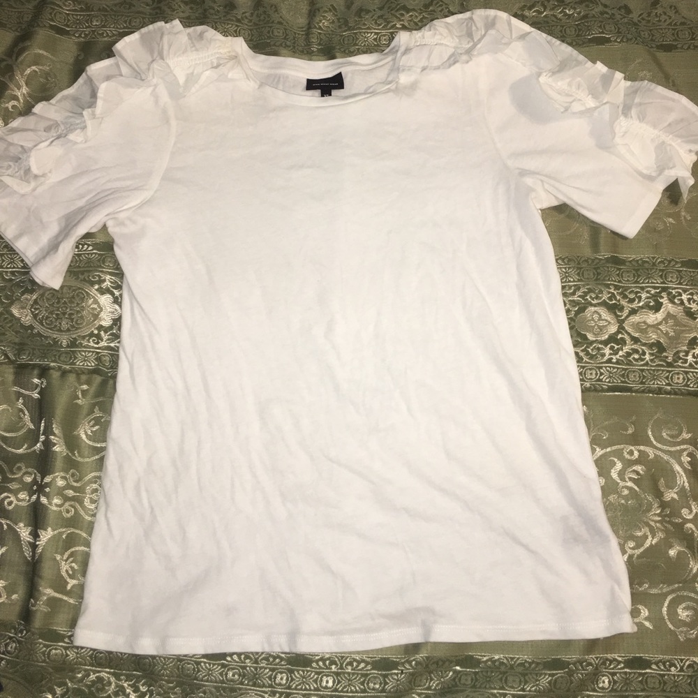 White ruffle shirt