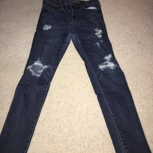 distressed dark wash skinny jeans
