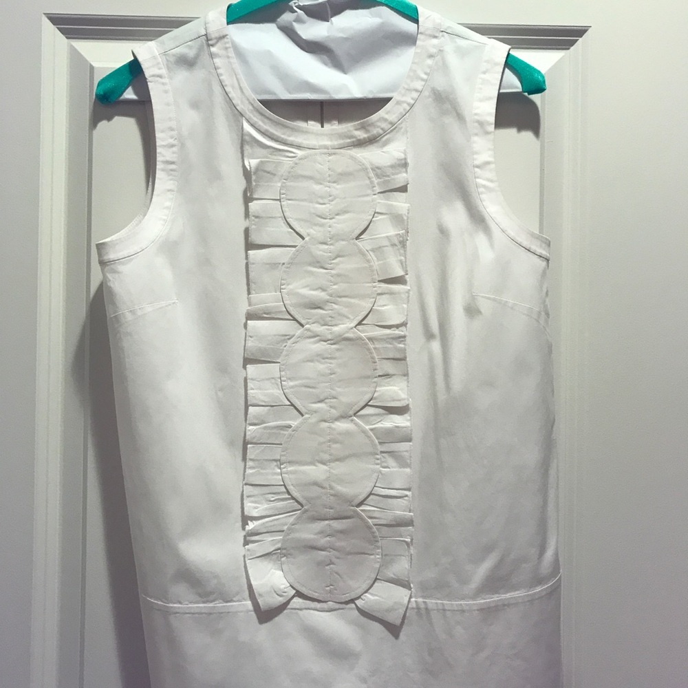 Kate Spade white sleeveless shirt.