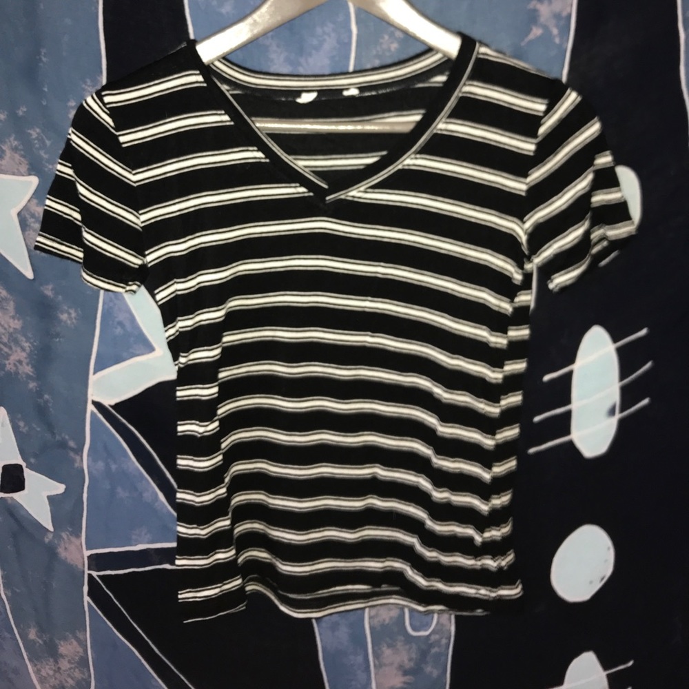 Tillys black and white vneck.