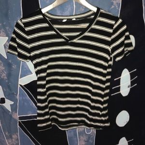 Tillys black and white vneck.