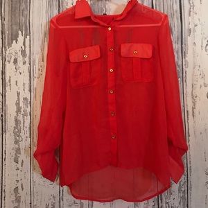 Reddish/orange long sleeve button up women’s shirt