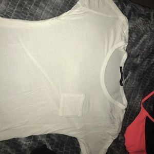 Randy Melville white tee shirt