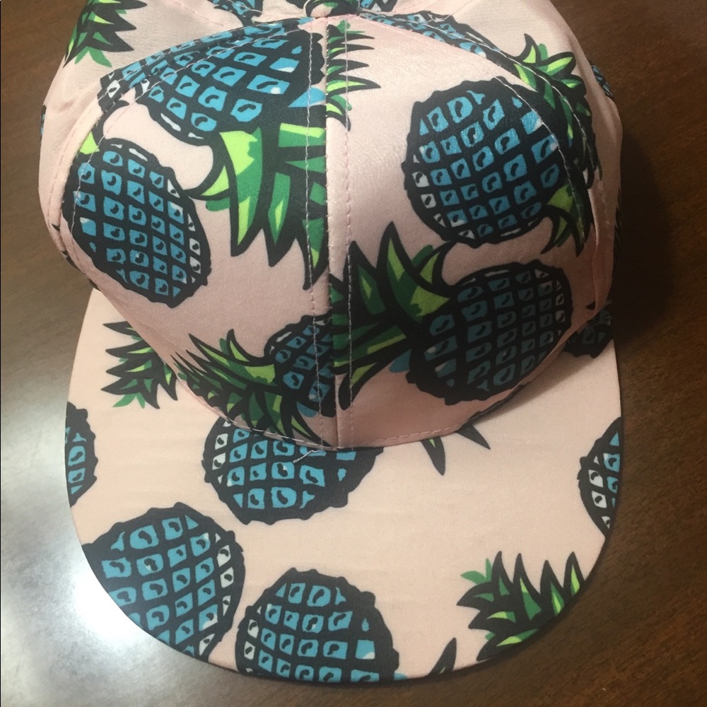 Pink and blue pineapple snap back.