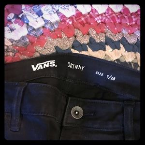 VANS Black skinny jeans.