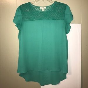 Green high low blouse.