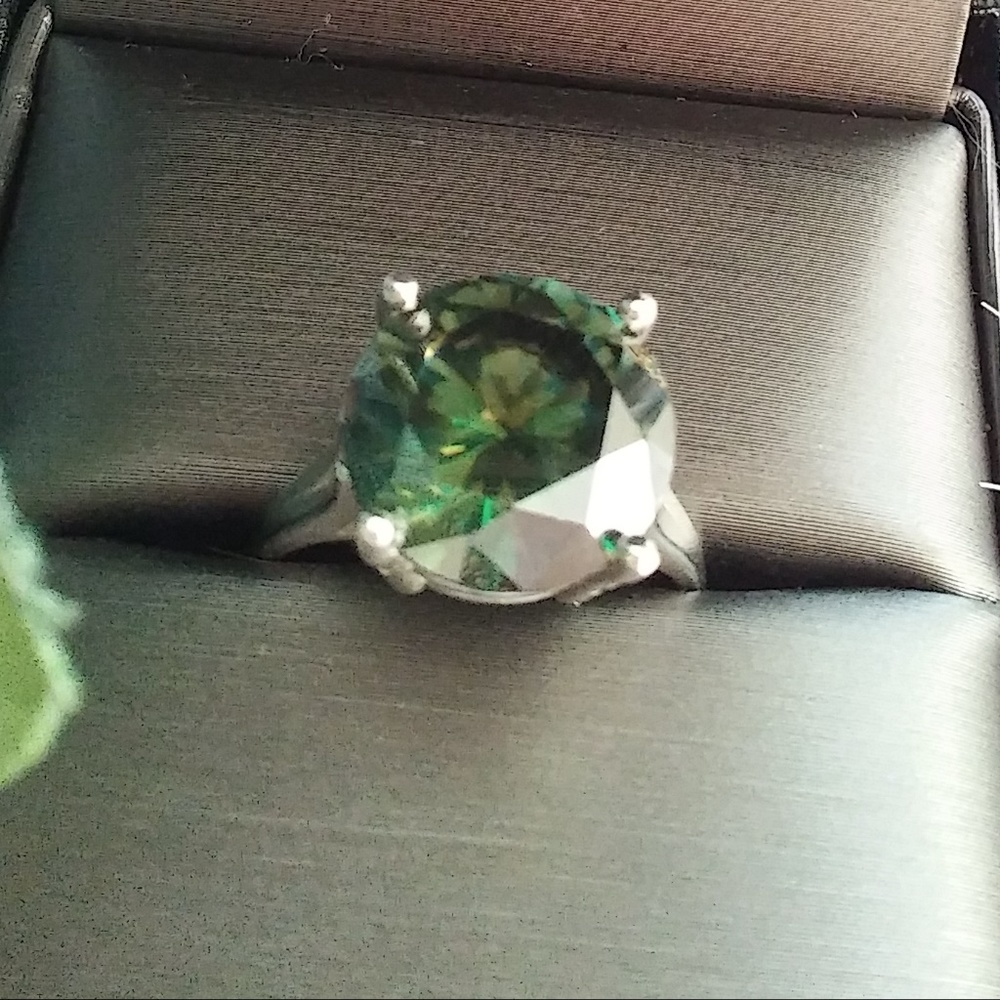 Round Moissanite ring set in sterling silver