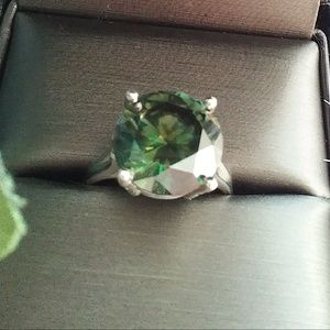 Round Moissanite ring set in sterling silver