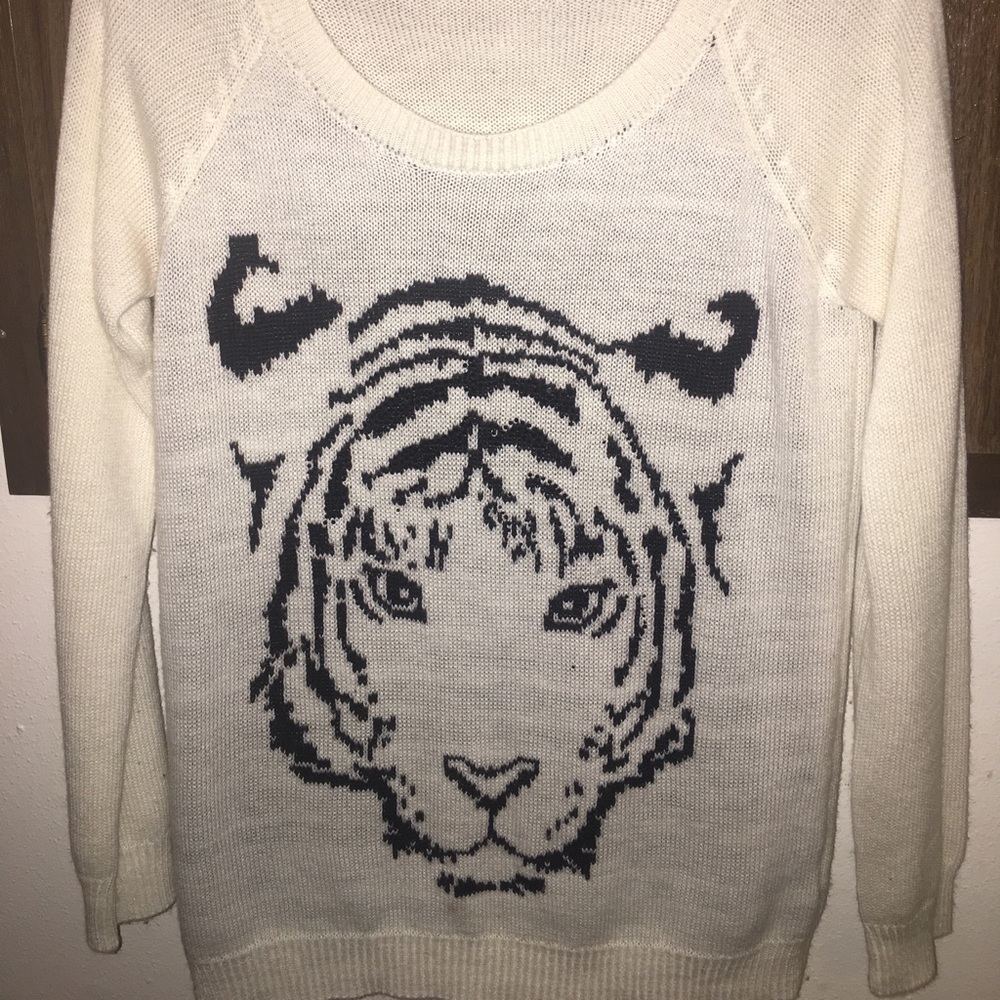 Tiger printed sweater type material shirt.