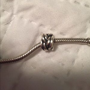 Forget me knot pandora charm.