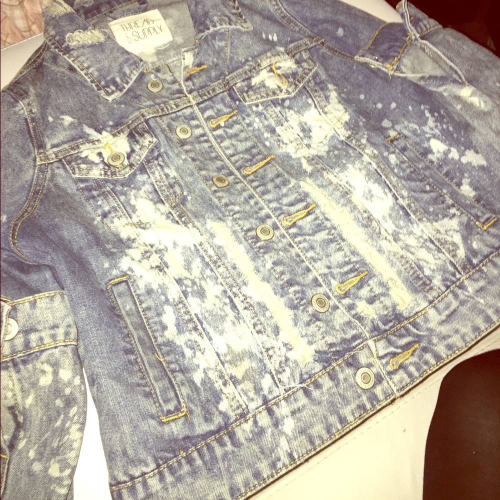 Distressed jean jacket