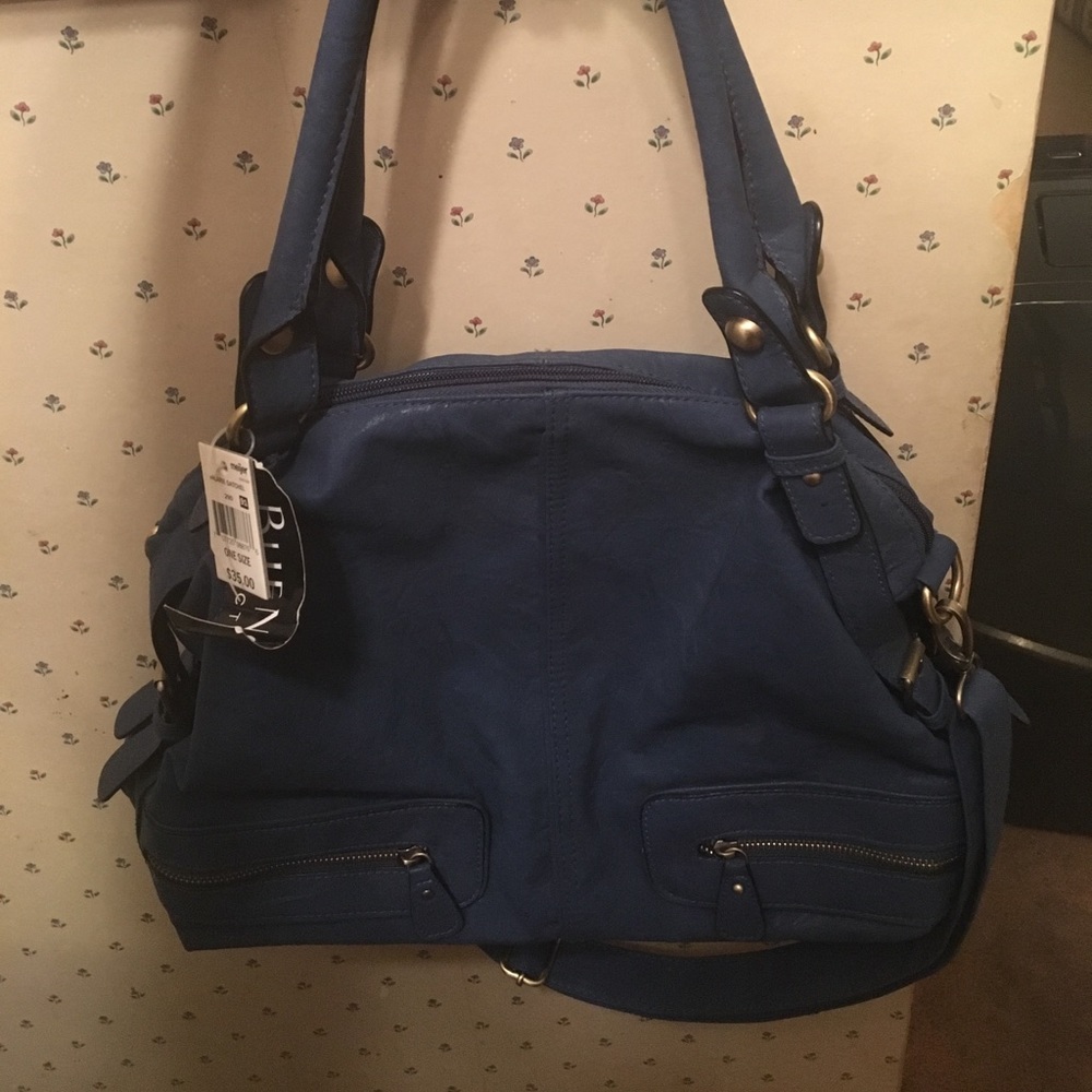 Never carried blue purse