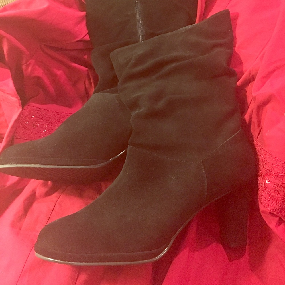 Never worn black boots