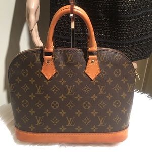 Authentic LV Alma PM hand bag