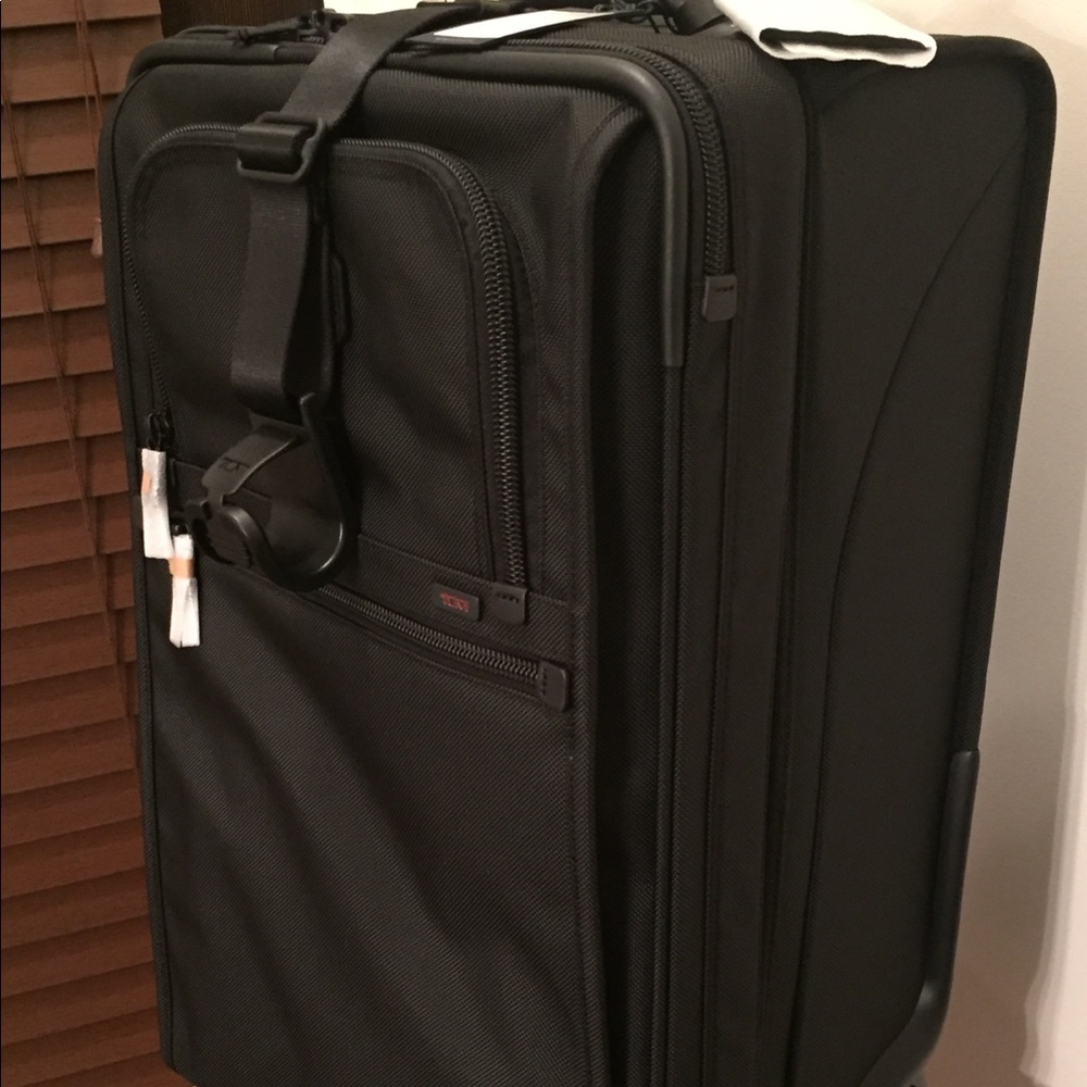Authentic Tumi Suitcase — BRAND NEW, NEVER USED!
