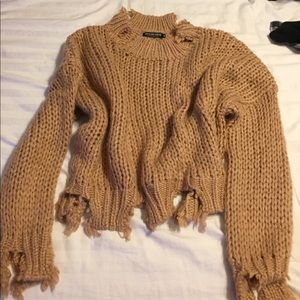 Distressed sweater