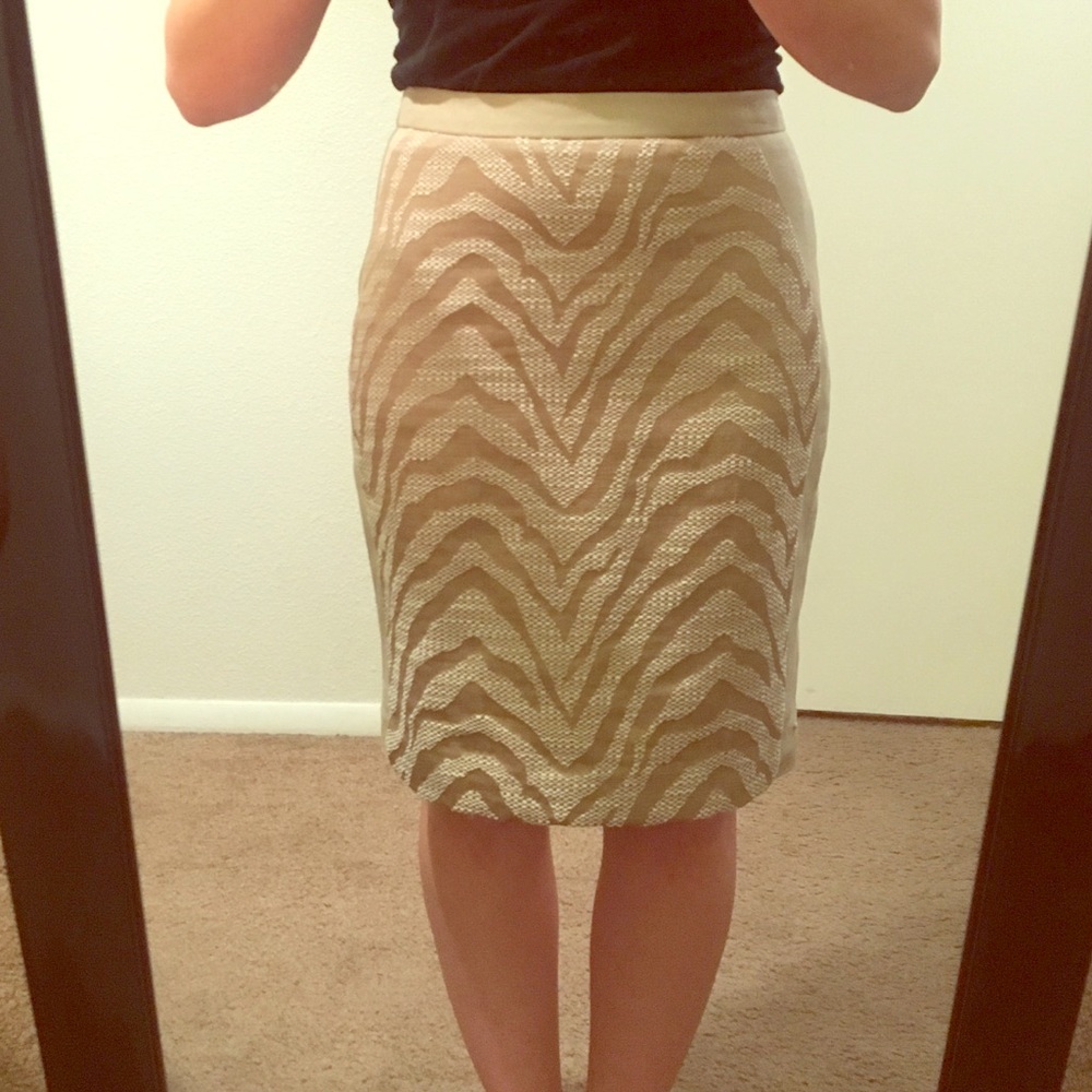 Tan animal print pencil skirt.