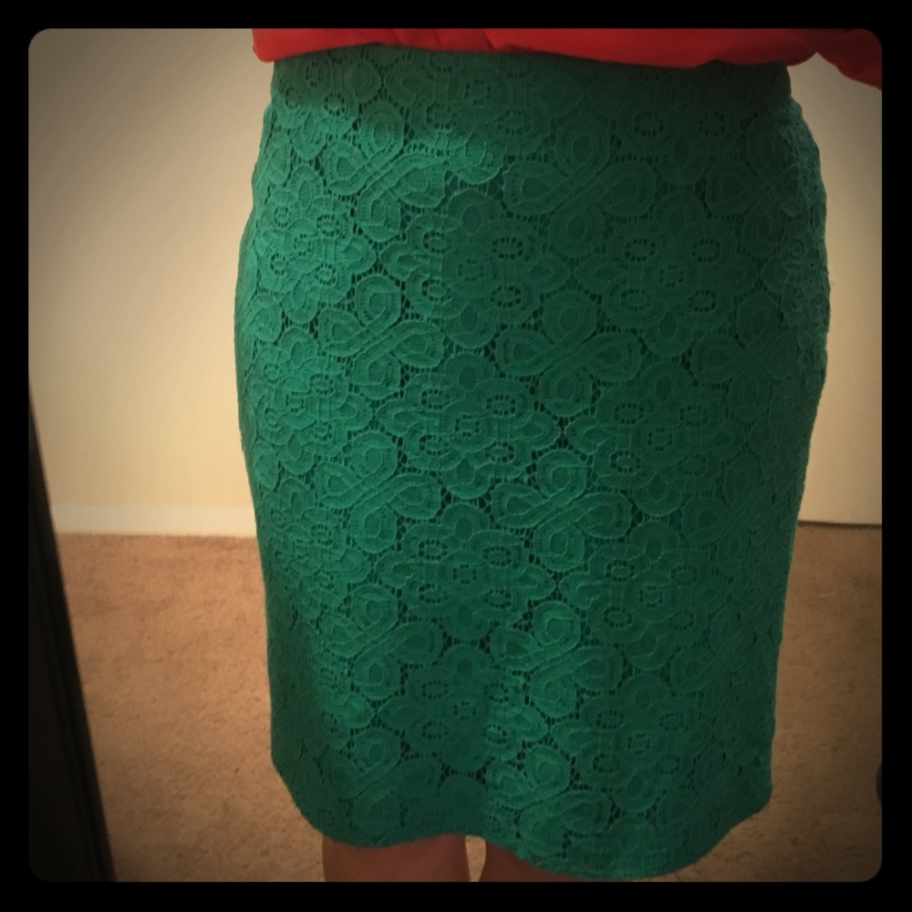 Teal/green lace overlay pencil skirt.