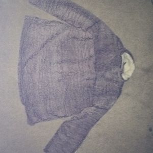 A fuzzy maroon sweater never wore size xL