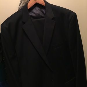 Navy suit by combatant gentleman