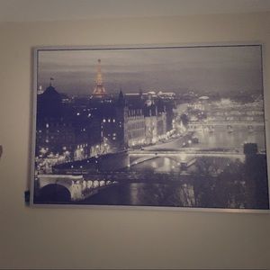 Black and white canvas of Paris with gold accent.