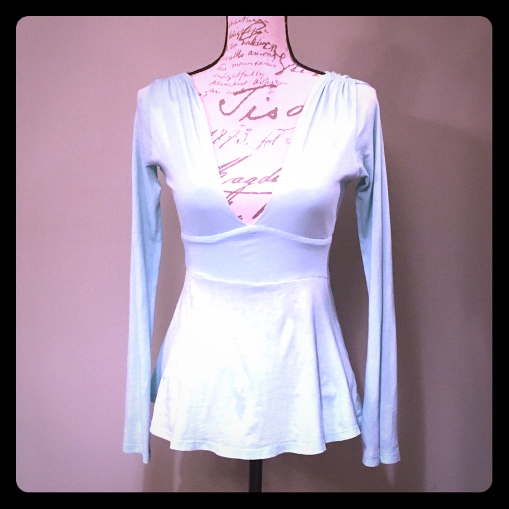 Light green blue A-line shirt.