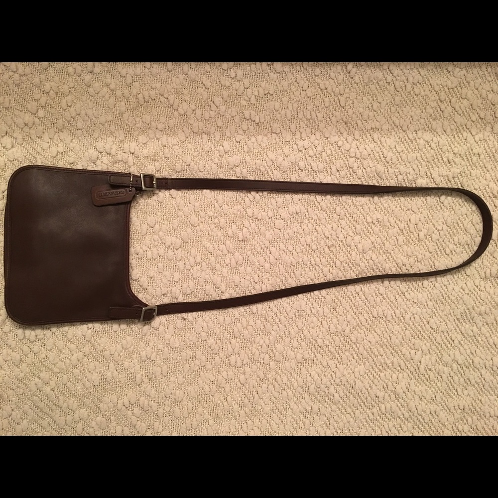 Authentic small brown Coach cross-body purse.