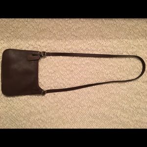 Authentic small brown Coach cross-body purse.