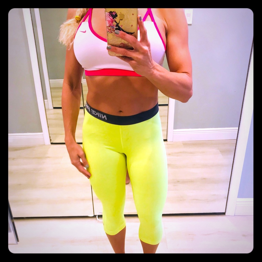 Bright yellow Nike pro crop pants