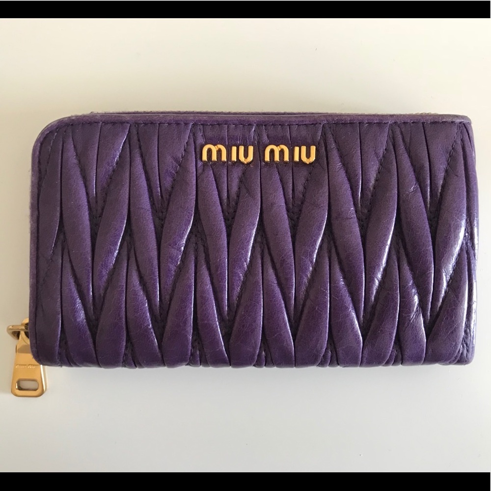 Miu Miu Matelasse leather zip around card case.