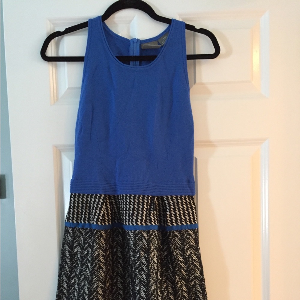 Merino wool sweater dress with silk hem.