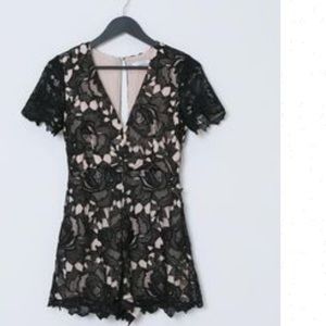 EUC Lush Black and Nude romper.