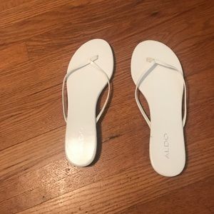 White leather Aldo flip flops - size 40.